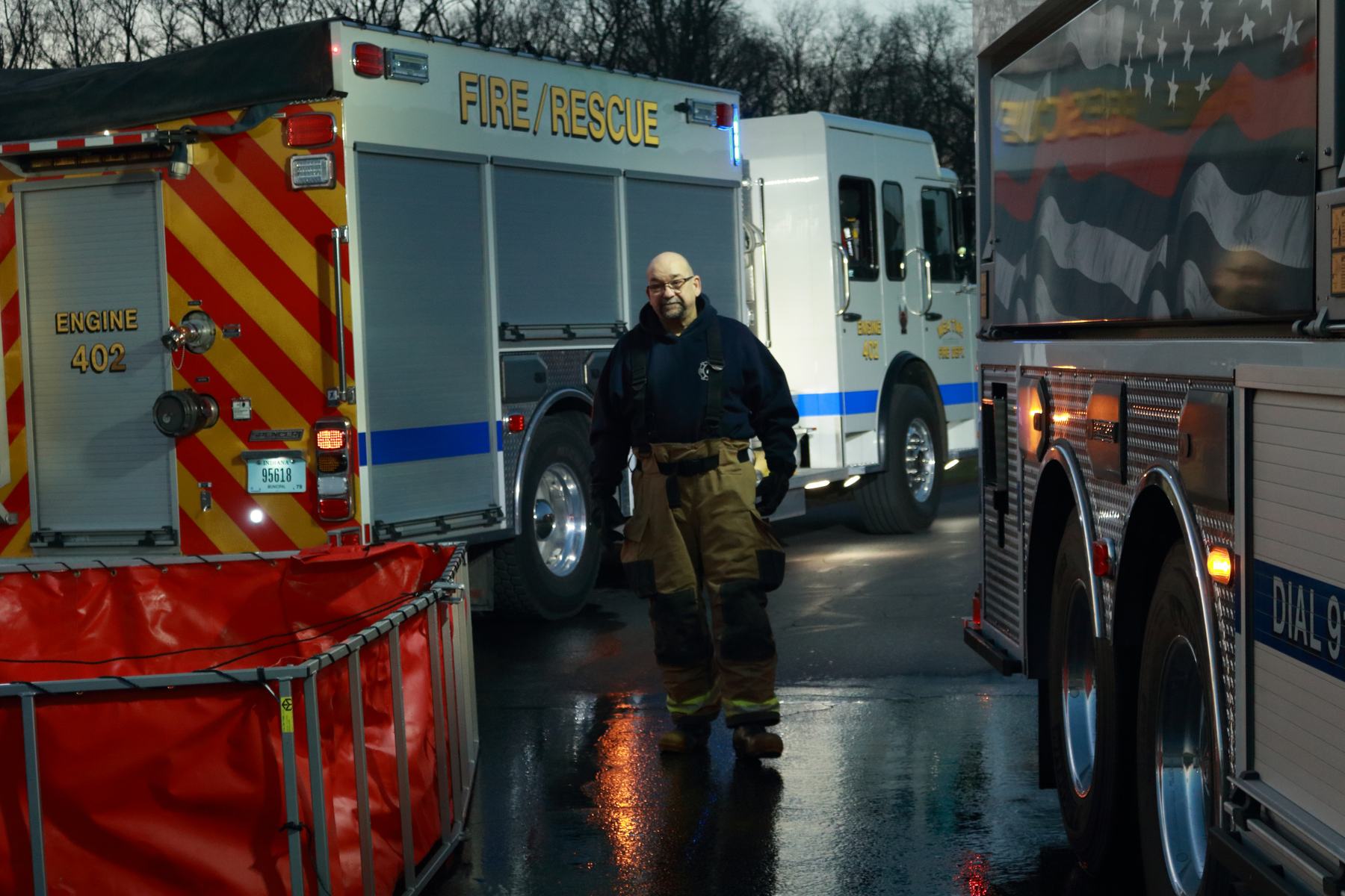 Engine and rescue staged for a drafting drill at dusk